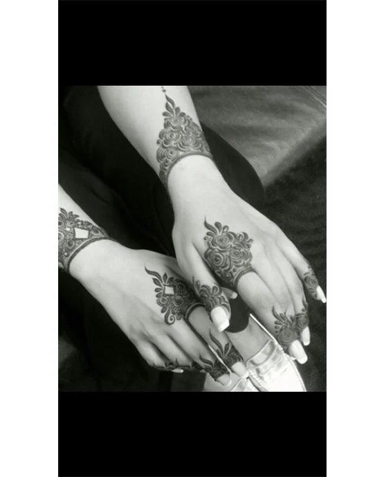 Classic Petal And Peacock Featuring Finger Mehndi Design